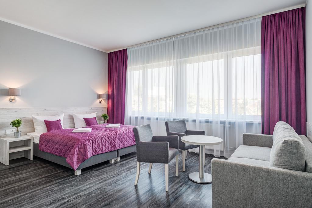 Arktur City Hotel Берлин Экстерьер фото